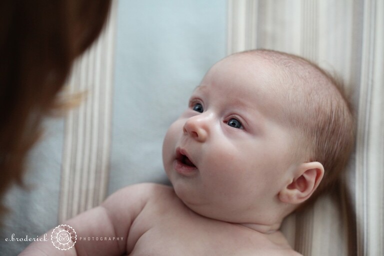 Looking up at her Mommy again. So intent!