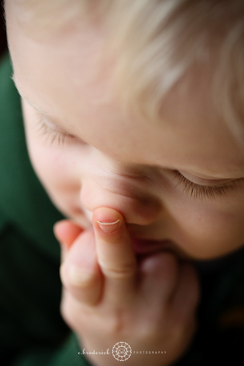 I know this is ridiculous. But it's so "little kid" the way he is wiping his nose. At least I think so!