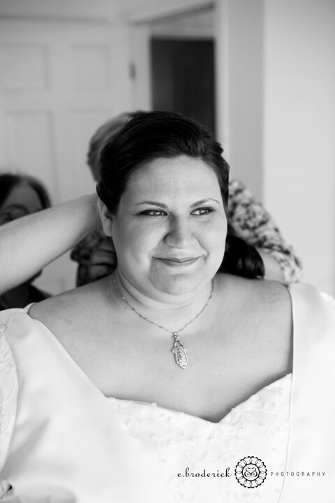 Here Sarah's mother and aunt help her put on her grandmother's necklace.