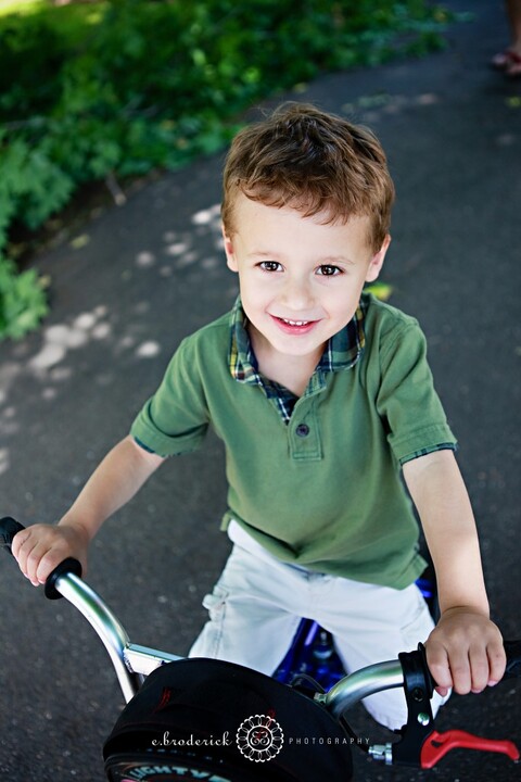 Sweet Jack. So proud of his Lightening McQueen bike.