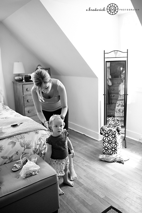 Ginny helps her other niece get ready. Talk about having the cutest wedding party ever!