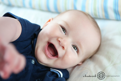 A smile like this can make everything all right. Love that he is reaching for my camera!
